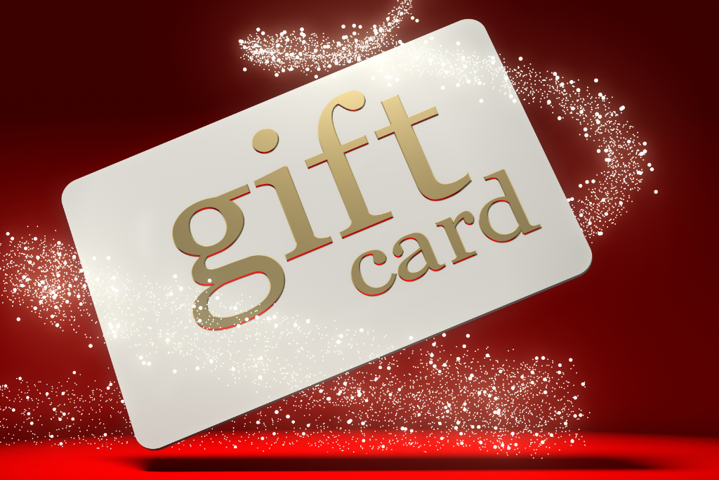 white gift card with gold lettering on a red background